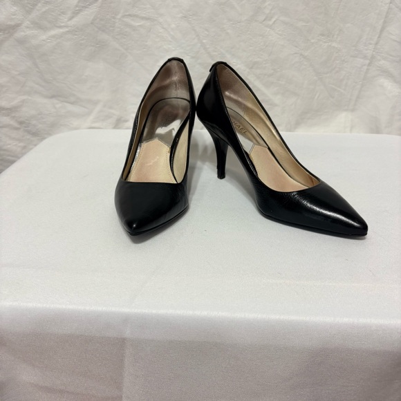 Michael Kors Shoes - Michael Kors Flex Mid-Heel pumps in black leather.